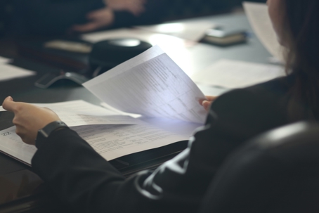 lady holding documents